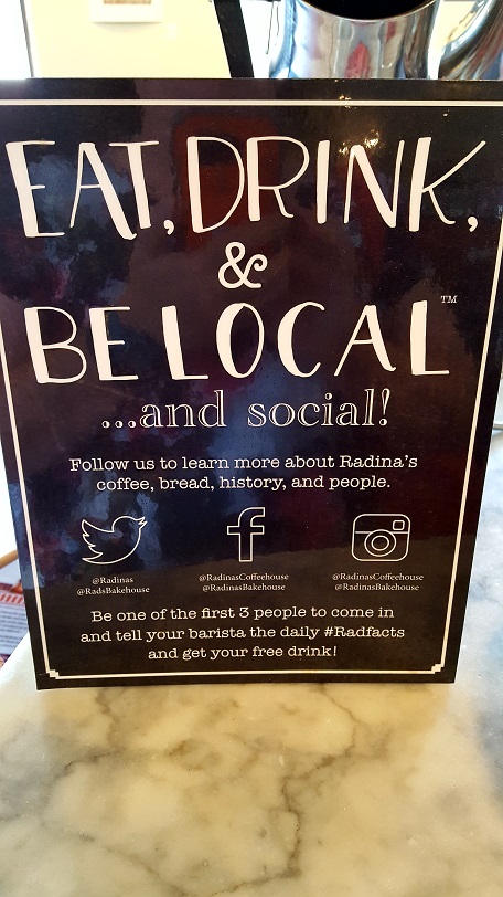 Social media signage Radina's downtown Manhattan KS (photo by Sheila Scarborough)