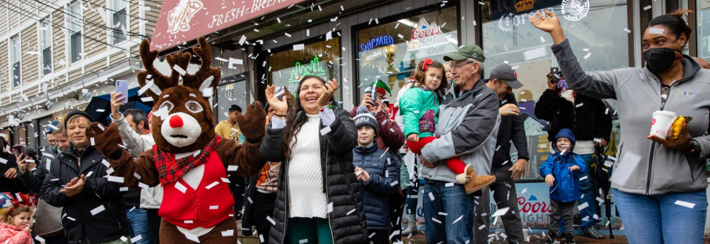 The Mayor’s Enchanted Trolley Tour stops at Wolcott Square in Hyde Park, December 2022. Courtesy of Mike Mejia for the Mayor of Boston’s Office.