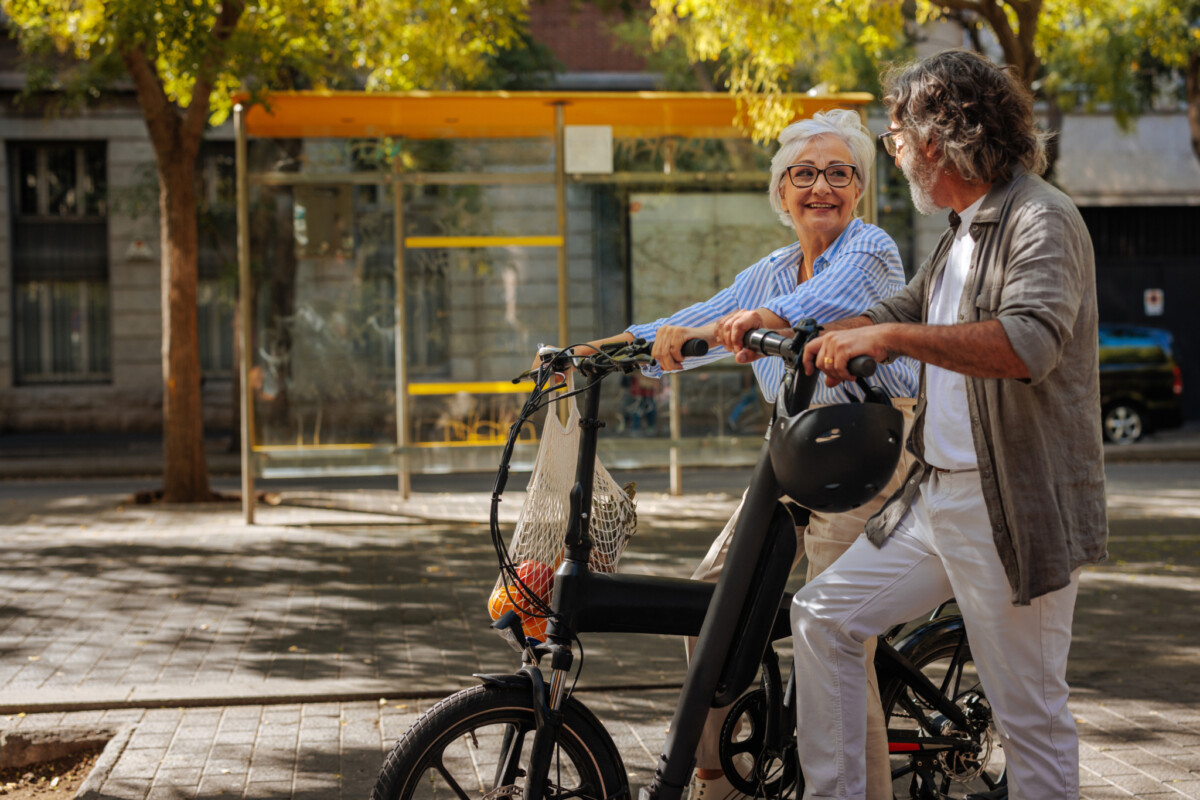 Seniors using electric bikes and scooters