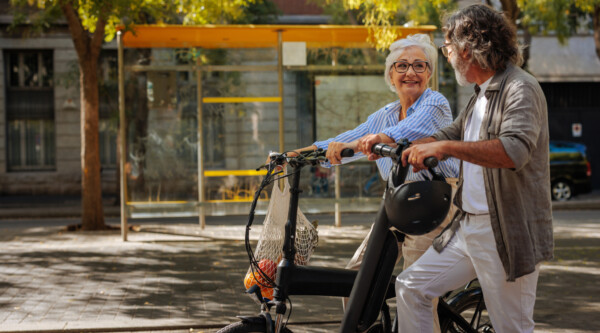 Seniors using electric bikes and scooters