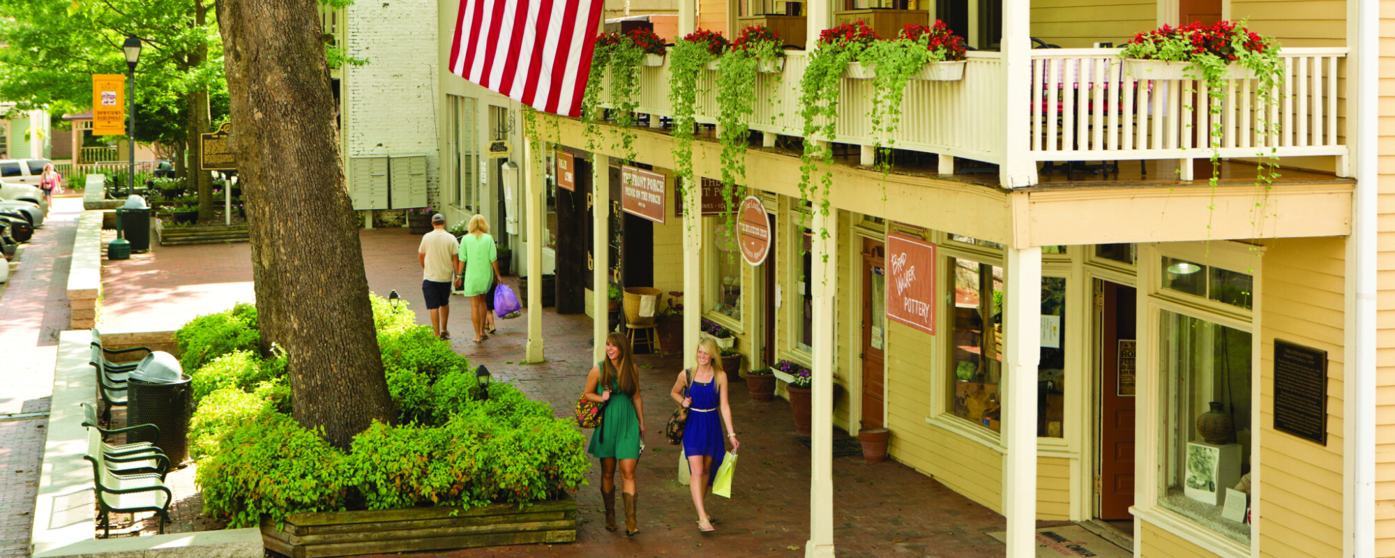 Wooden buildings with second story porches.