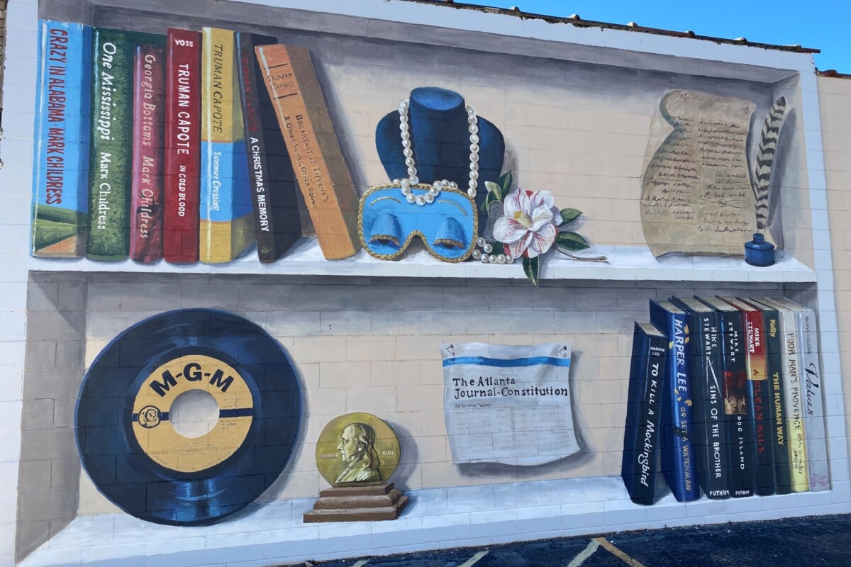 Mural featuring books and objects symbolizing writers.