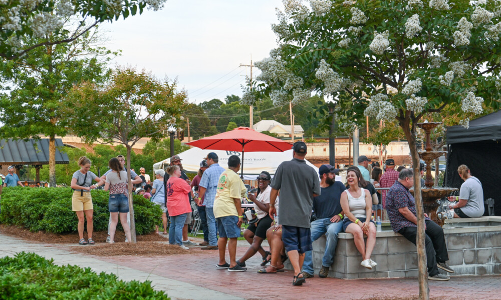 People gather in a plaza to socialize.