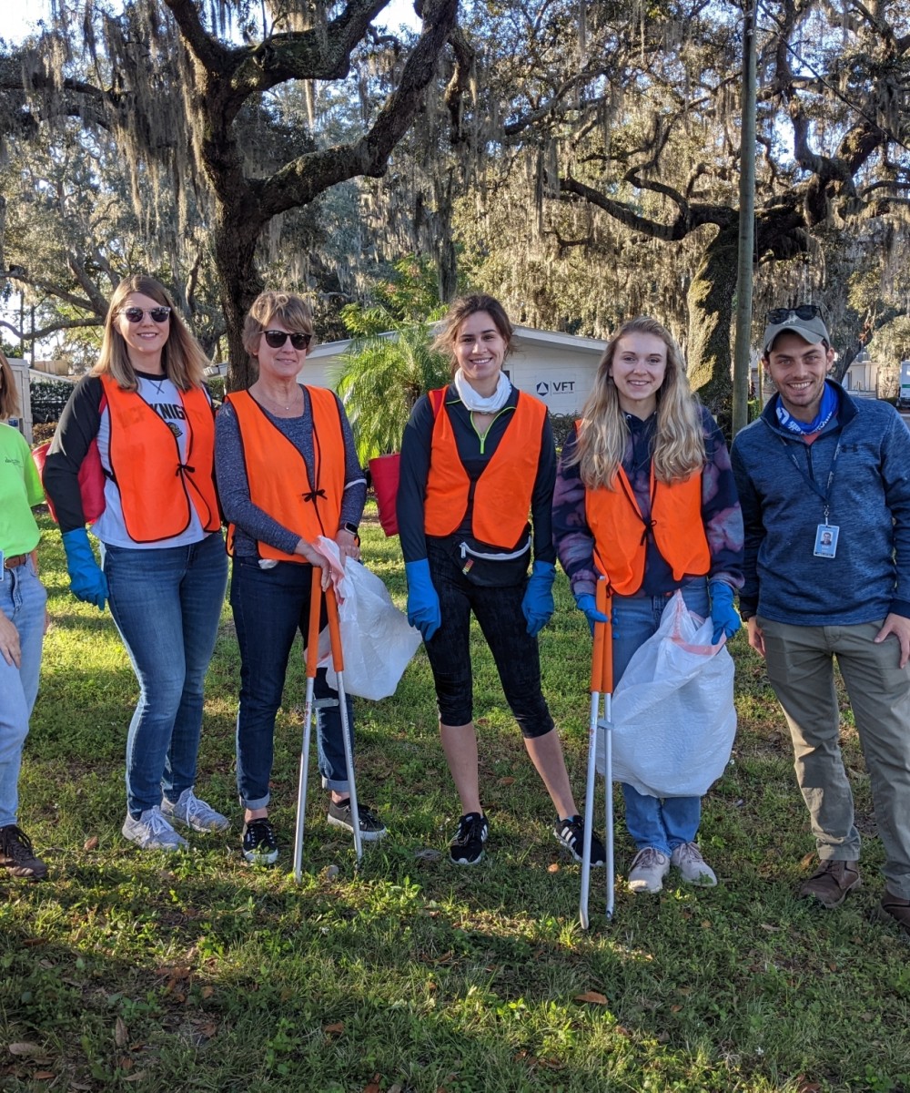 Volunteers picking up trash.