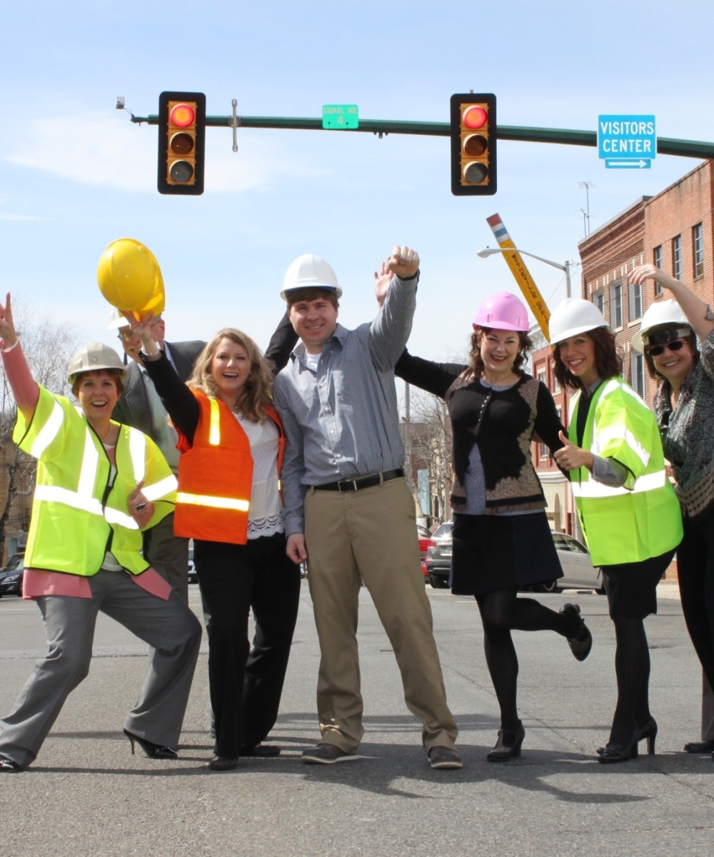 Volunteers in hard hats in Downtown Wytheville Inc.