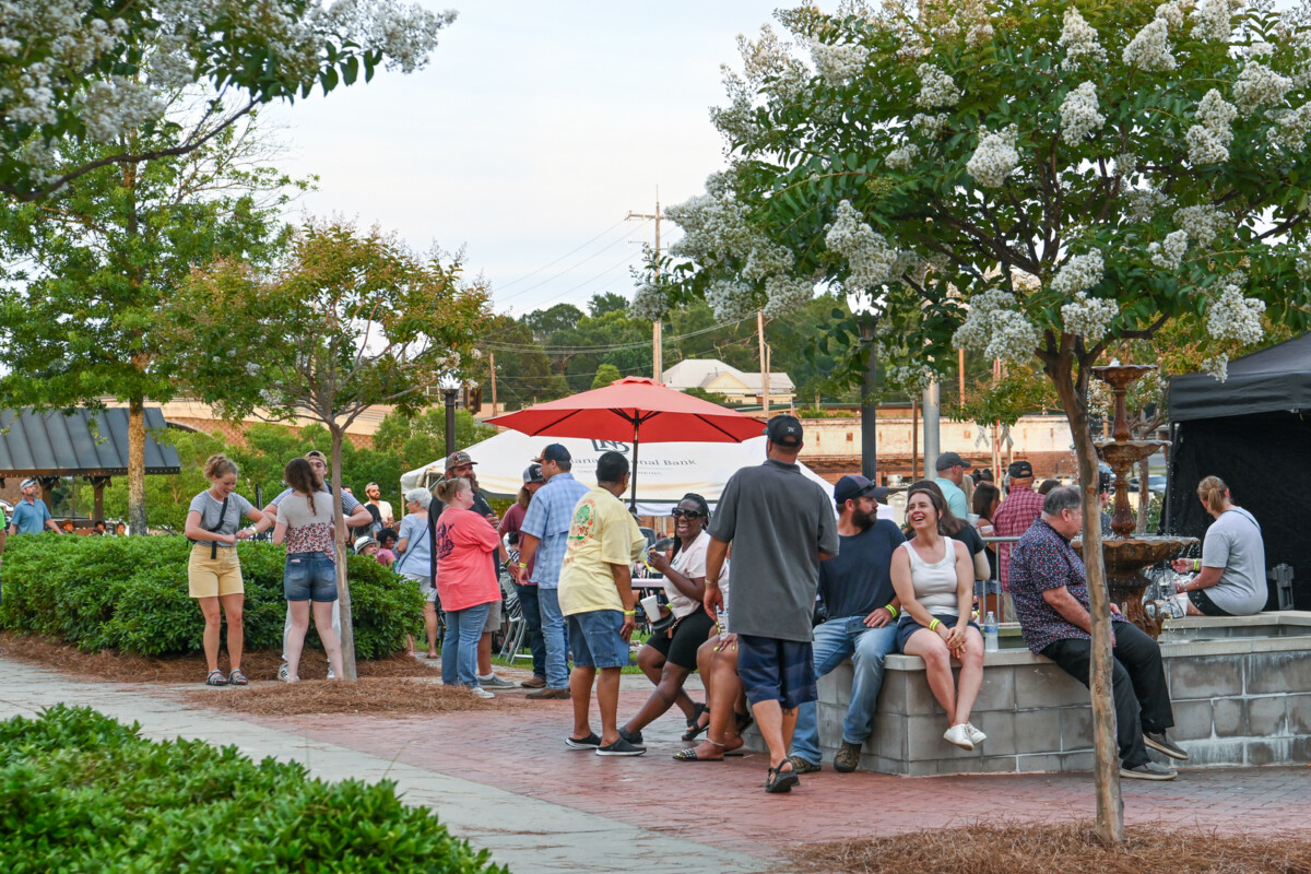 People gather in a plaza to socialize.