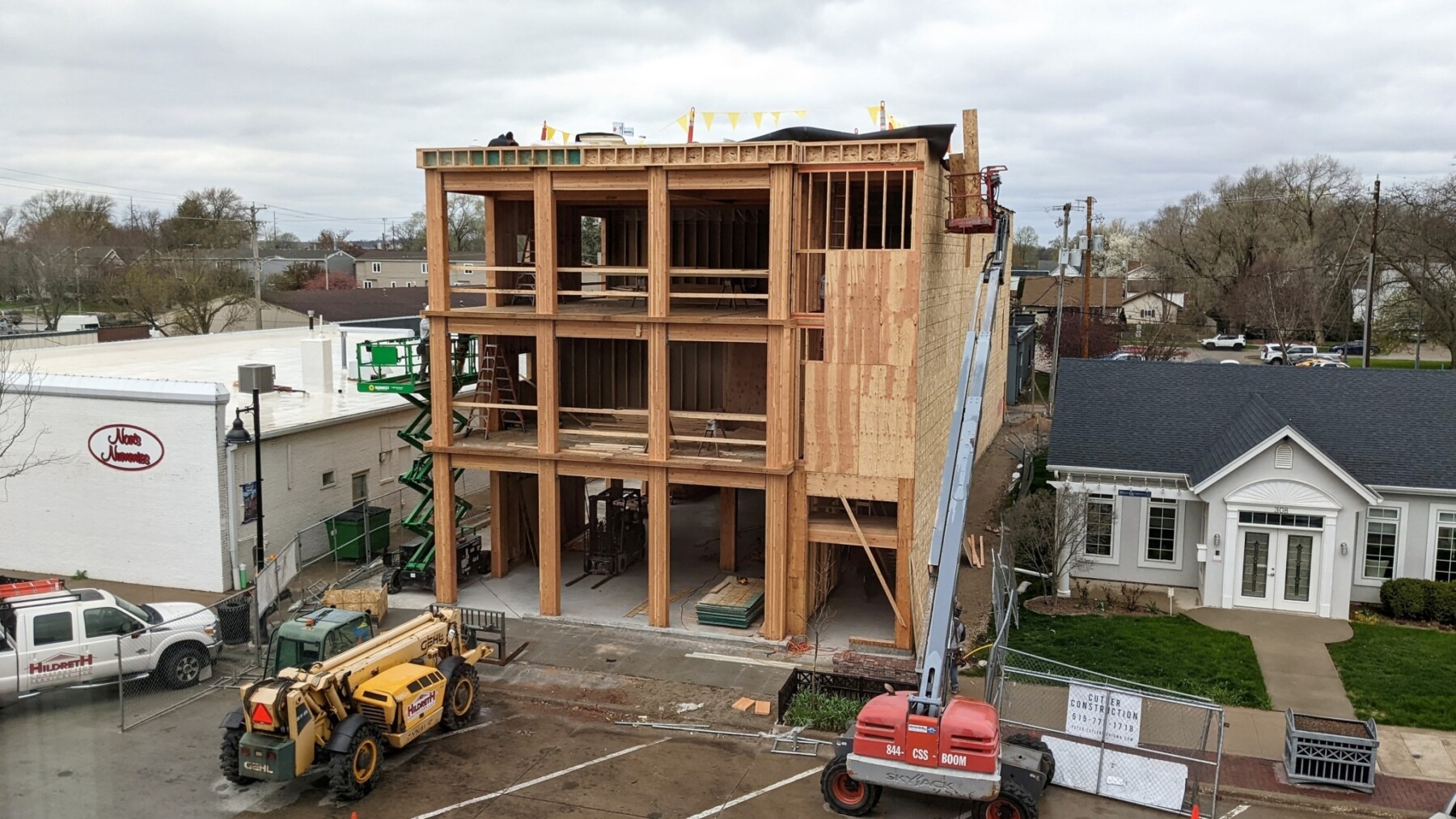 A small multi-family building during the framing process of construction