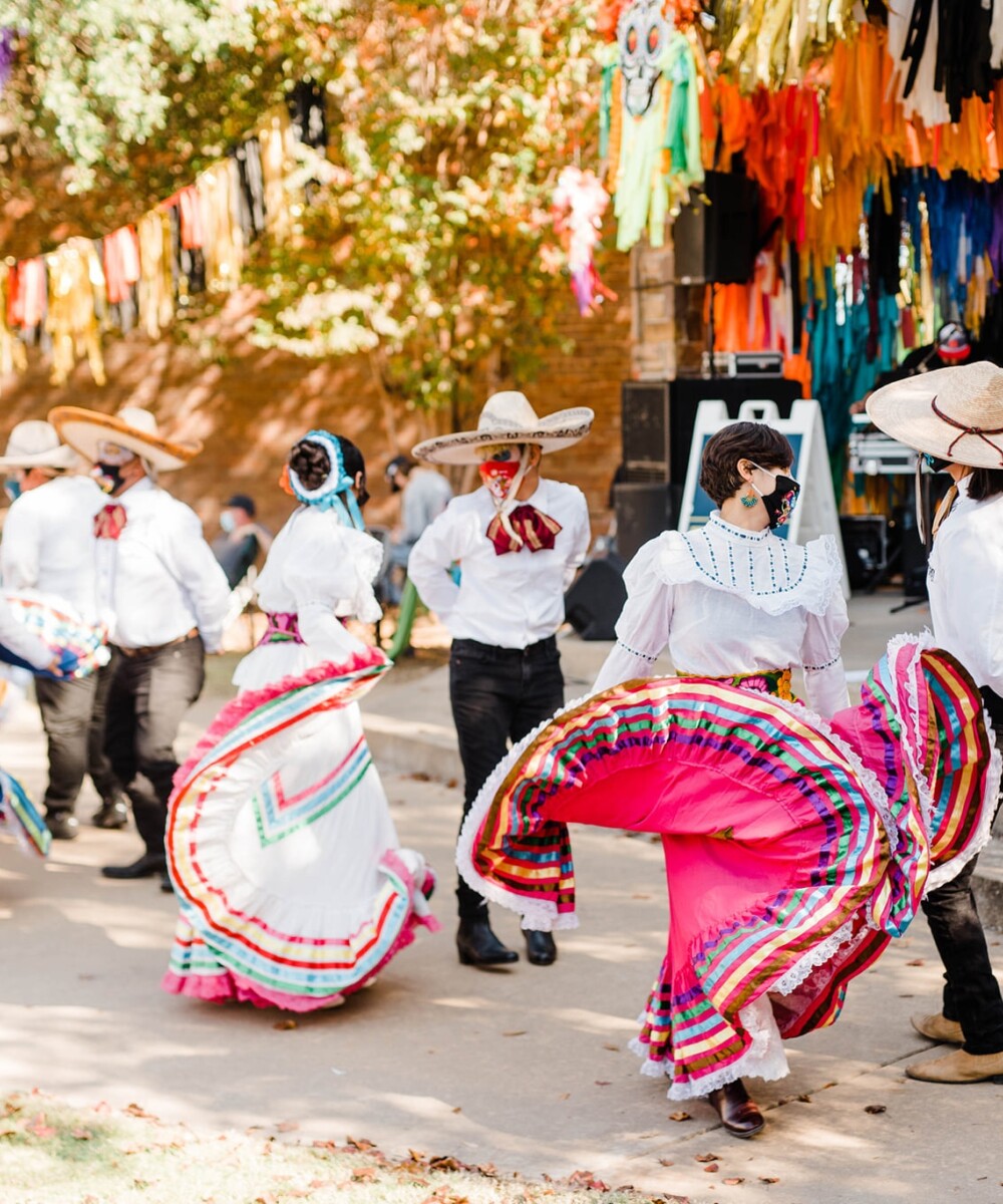 Dancers performing at the Dia de los Muertos celebration.