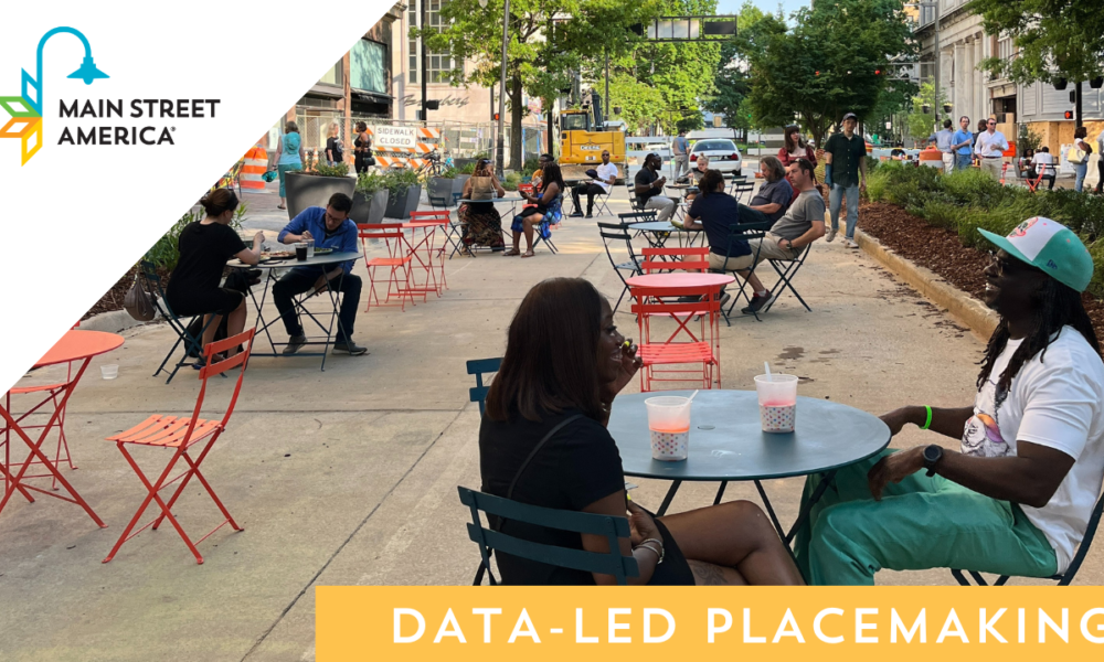 People sitting at tables in an street-turned-outdoor-gathering area. Overlaid text reads "Data-Led Placemaking"