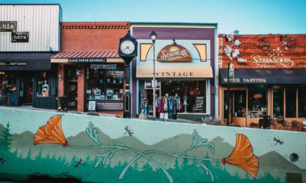 Mural and storefronts in a historic downtown