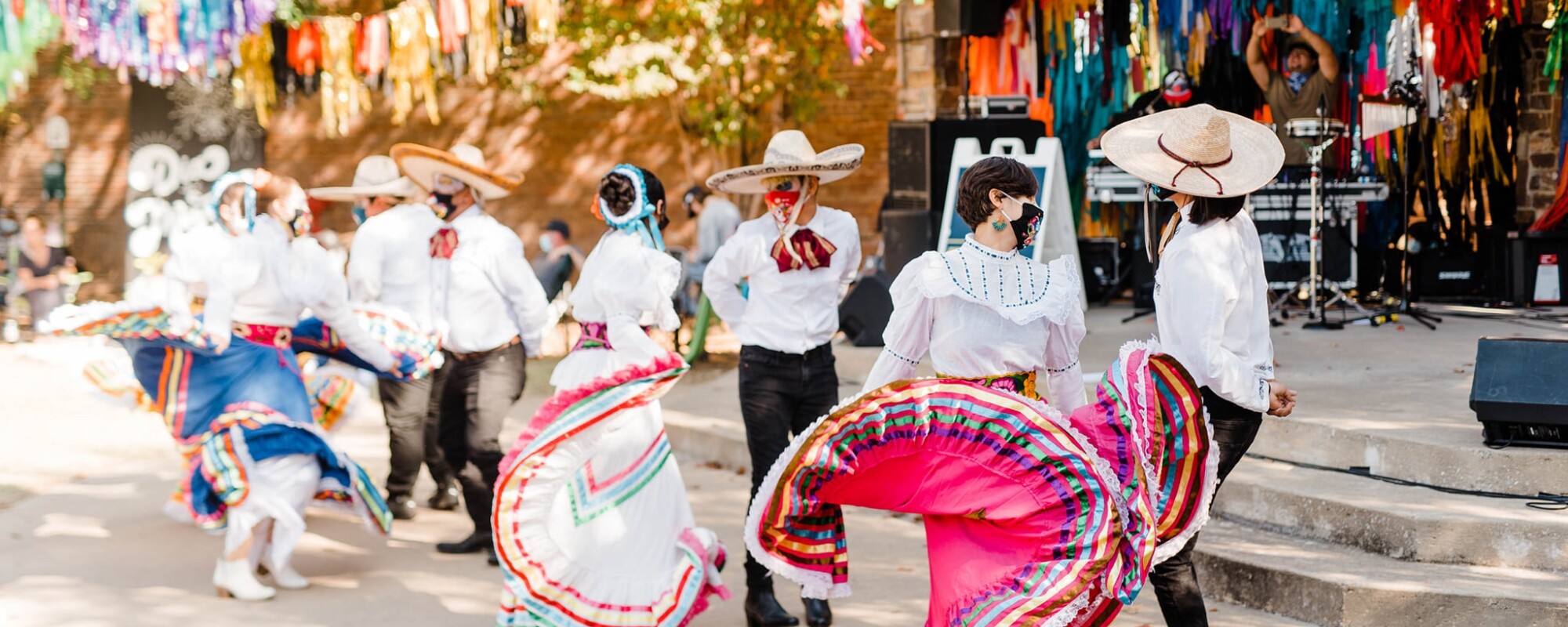 Dancers performing at the Dia de los Muertos celebration.