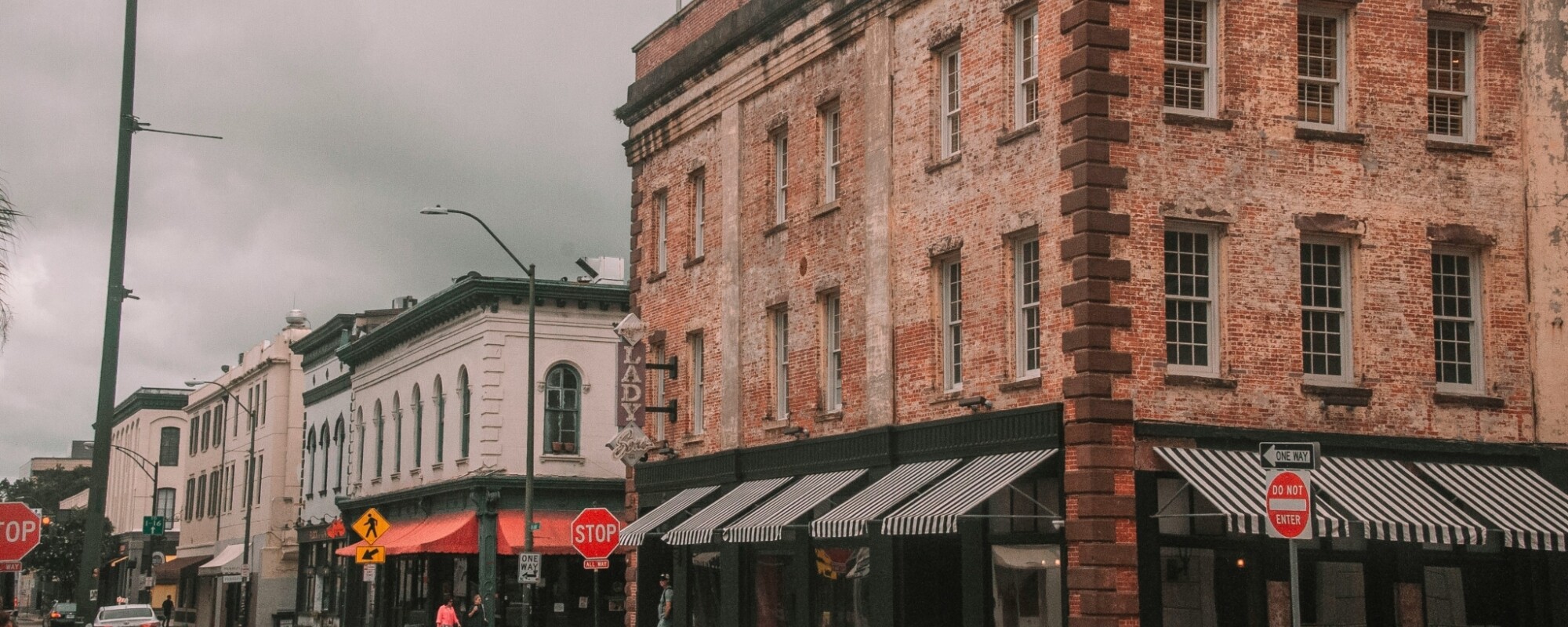 Historic brick buildings with awnings in Savannah, Georgia