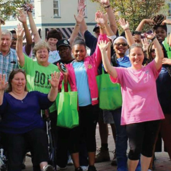 Volunteers celebrating after a clean-up event