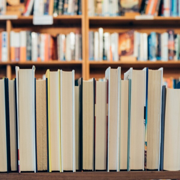 A shelf full of books in a library