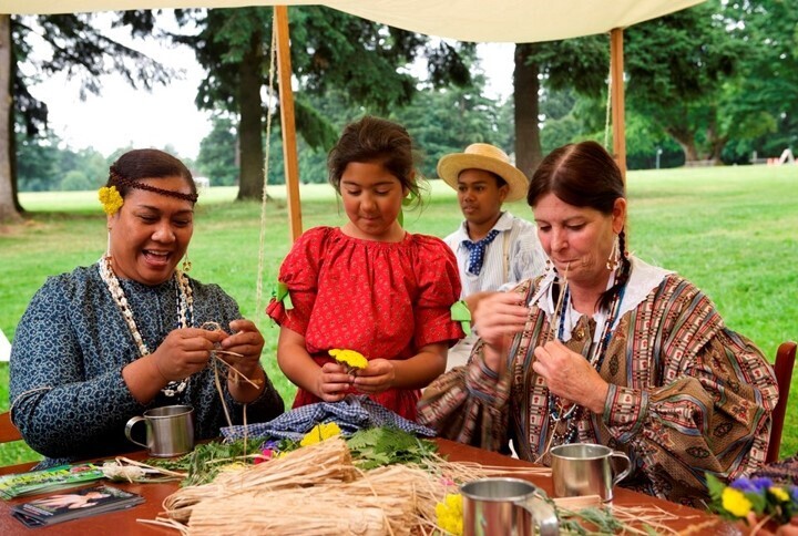 Volunteers portray Hawaiian workers at Fort Vancouver at Fort Vancouver National Historic Site's Brigade Encampment event