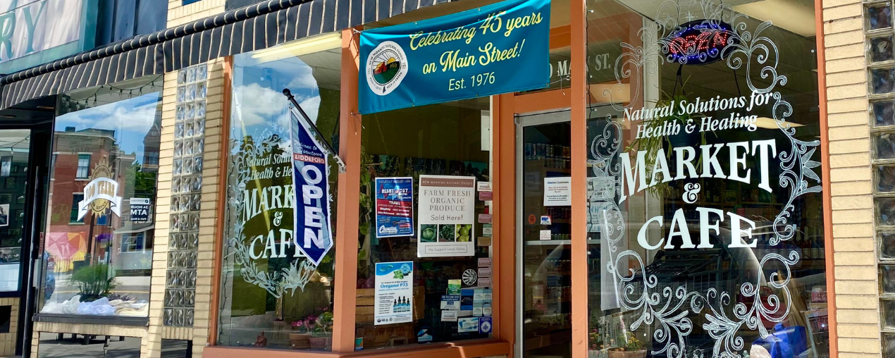 Small business storefront with banners and window decorations