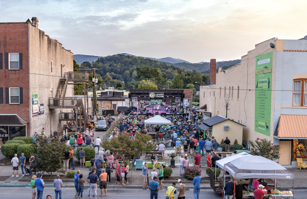 Aerial photo of large gathering of people in historic downtown