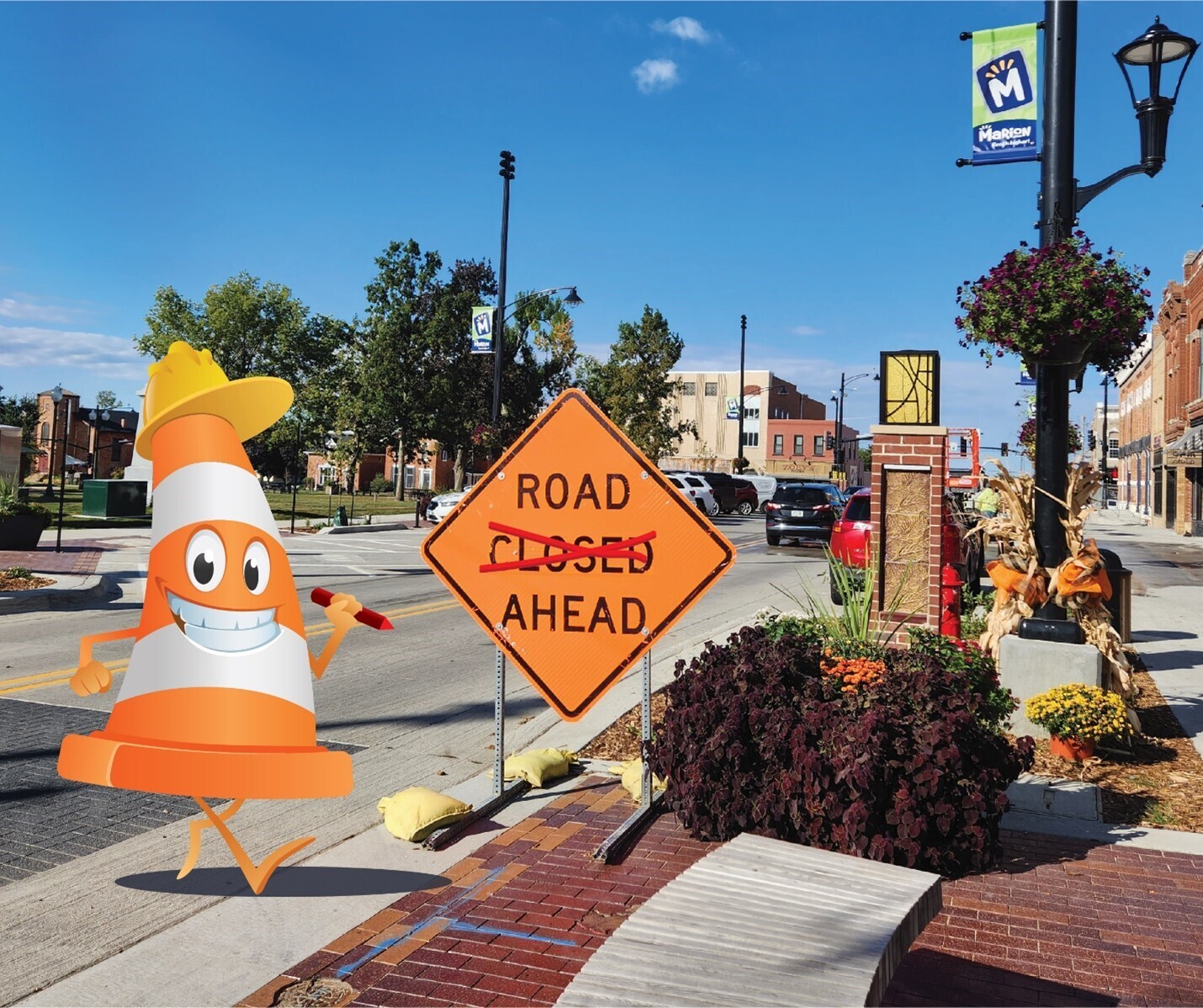 Photo of a downtown street with construction signs and a cartoon traffic cone