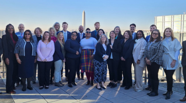 Hill Day 2024 participants pose in front of the Washington memorial