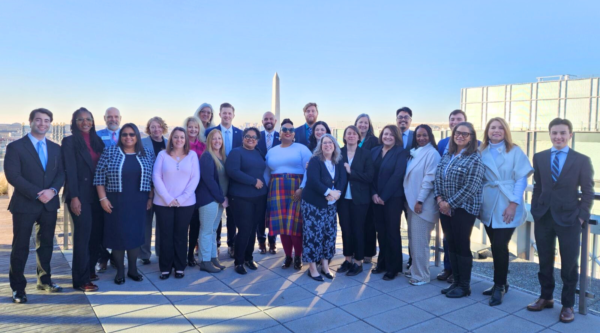 Main Street leaders pose in front of the Washington Monument