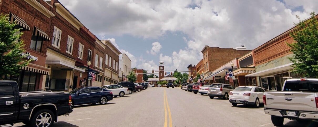 A downtown street with historic brick buildings