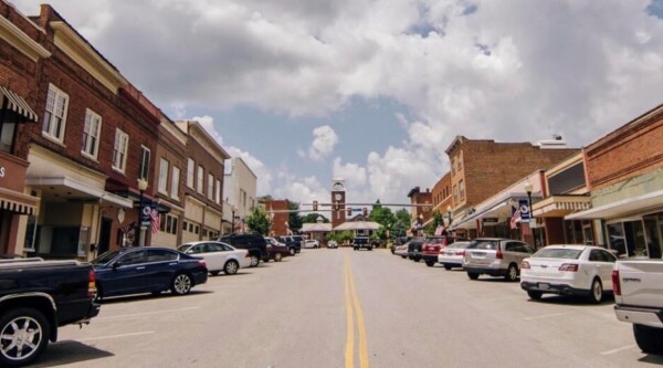 A downtown street with historic brick buildings