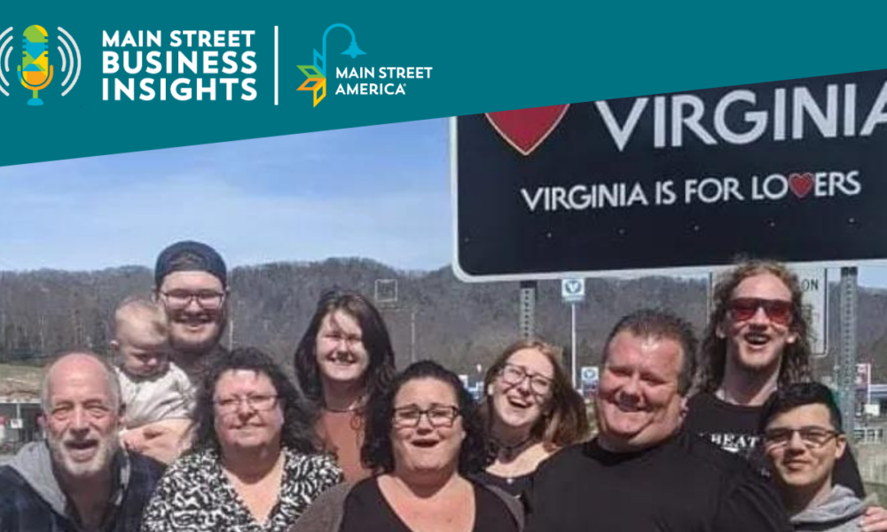 A family standing in front of a sign that reads: "Welcome to Virginia: Virginia is for Lovers"