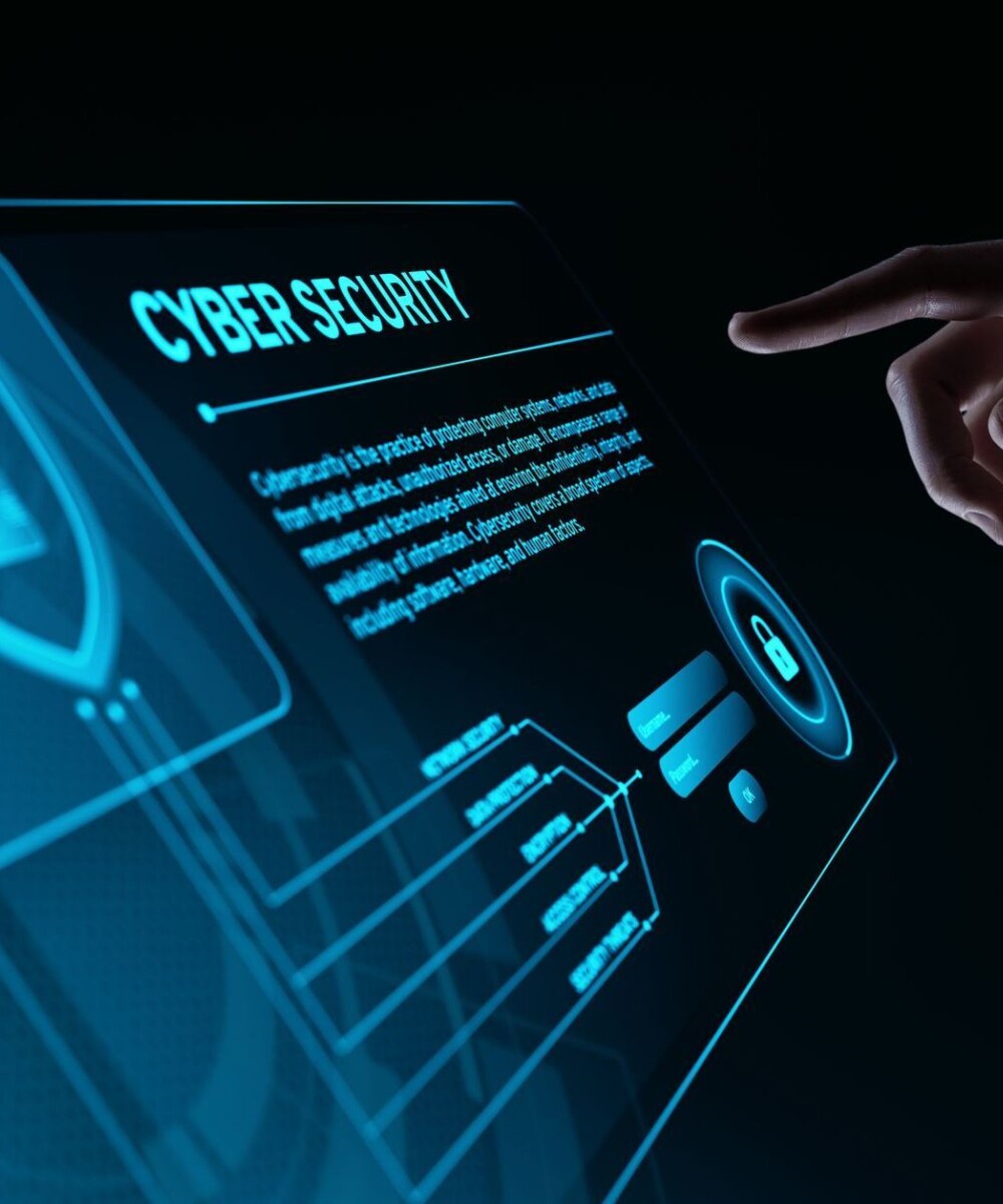 image of a hand with a touchscreen device that says cybersecurity