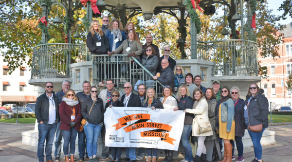 Group photo of Missouri Main Streeters in front of a gazebo