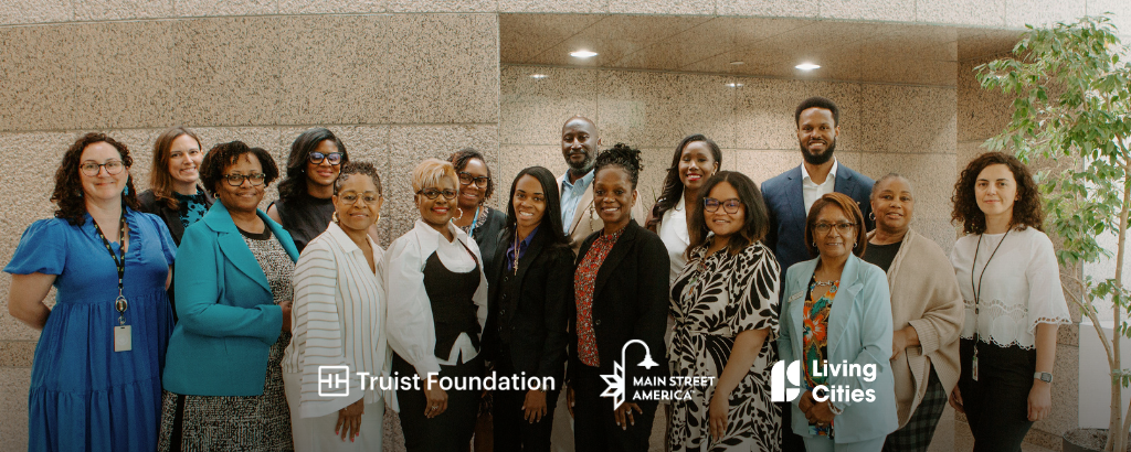 Group photo of B3 team partners, stakeholders, and small business owners in Charlotte, North Carolina with logo overlays for Truist Foundation, Main Street America, and Living Cities