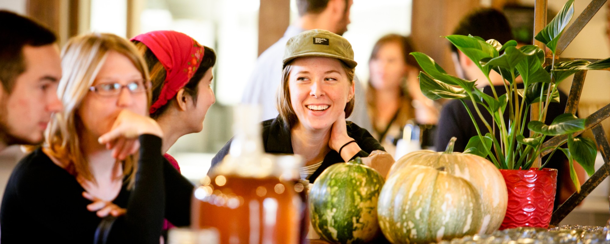 People sitting at a restaurant counter.