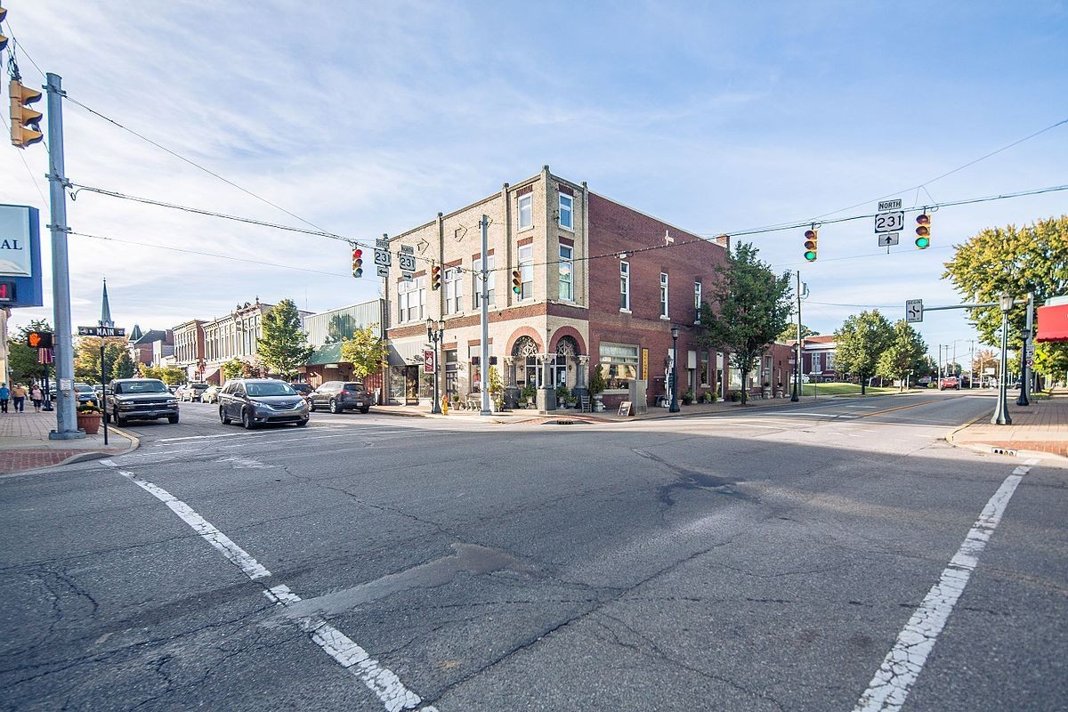 Historic brick building at an intersection in Huntingburg, Indiana