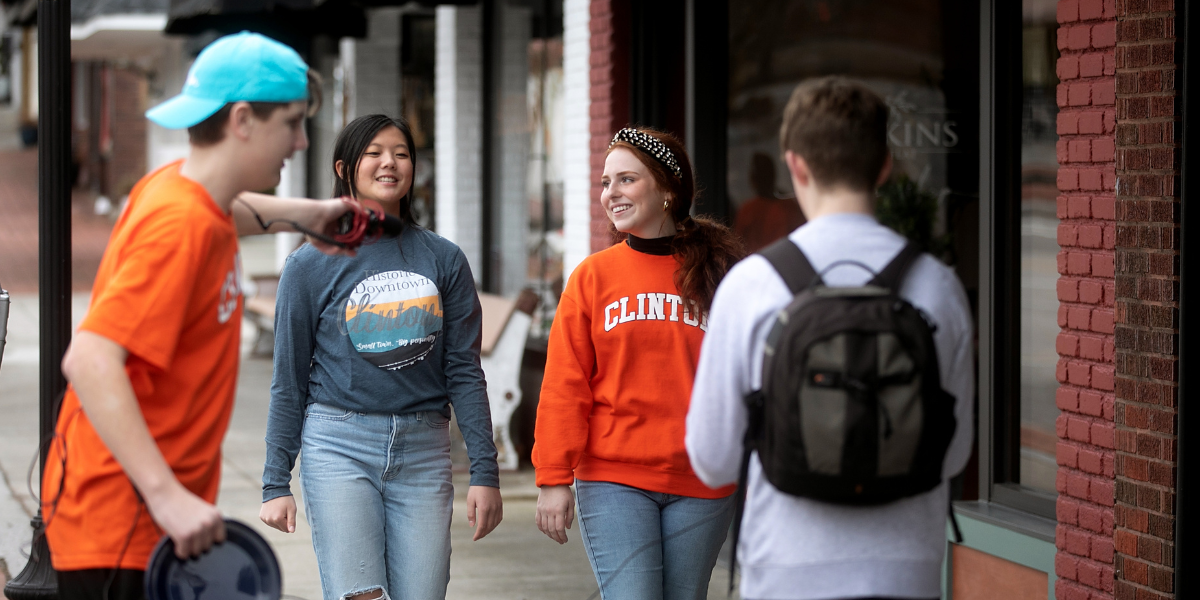 Young people filming a promotional video downtown