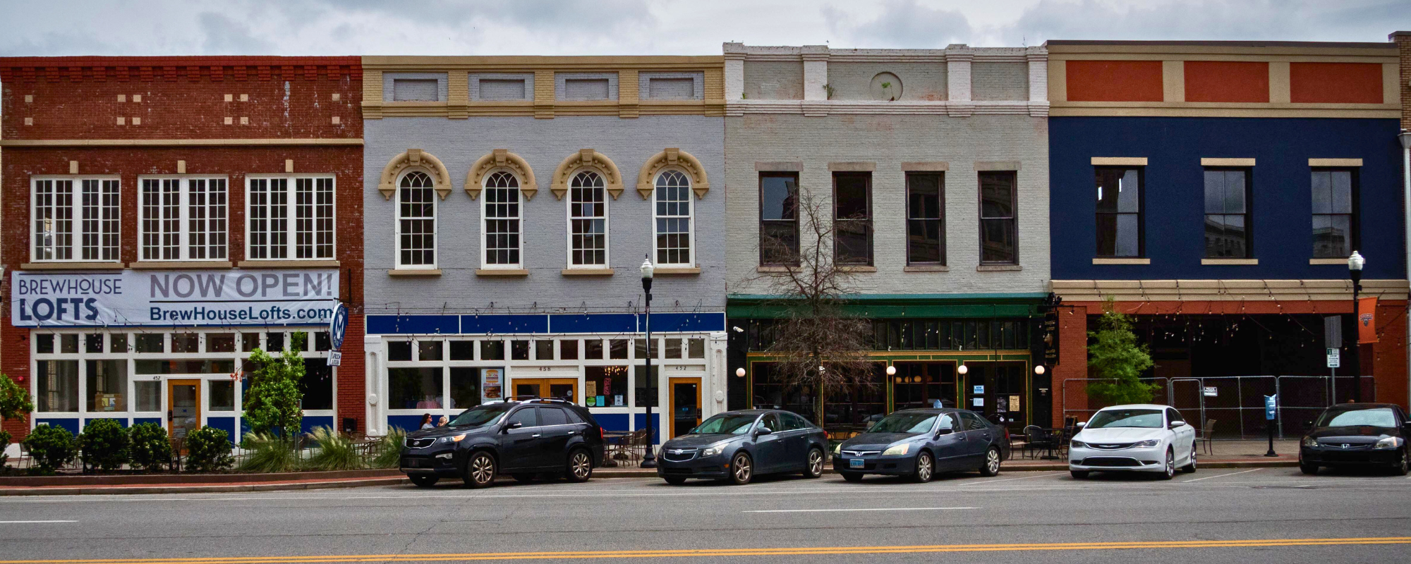 A row of historic buildings with colorful facades