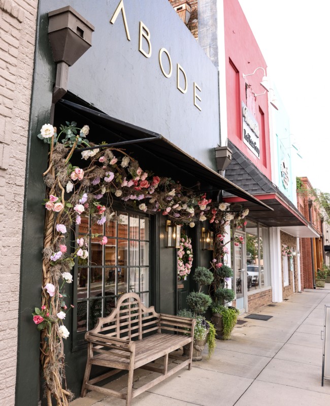 Roses and twigs decorating a chic storefront