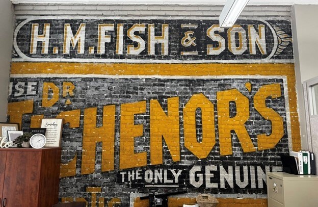 Historic painted sign for HM Fish and Son
