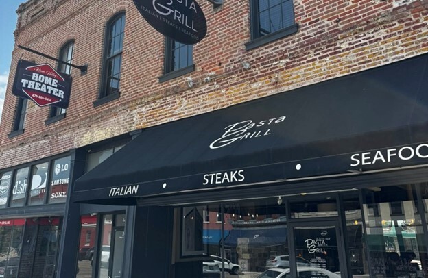 Brick storefront with a cute local restaurant