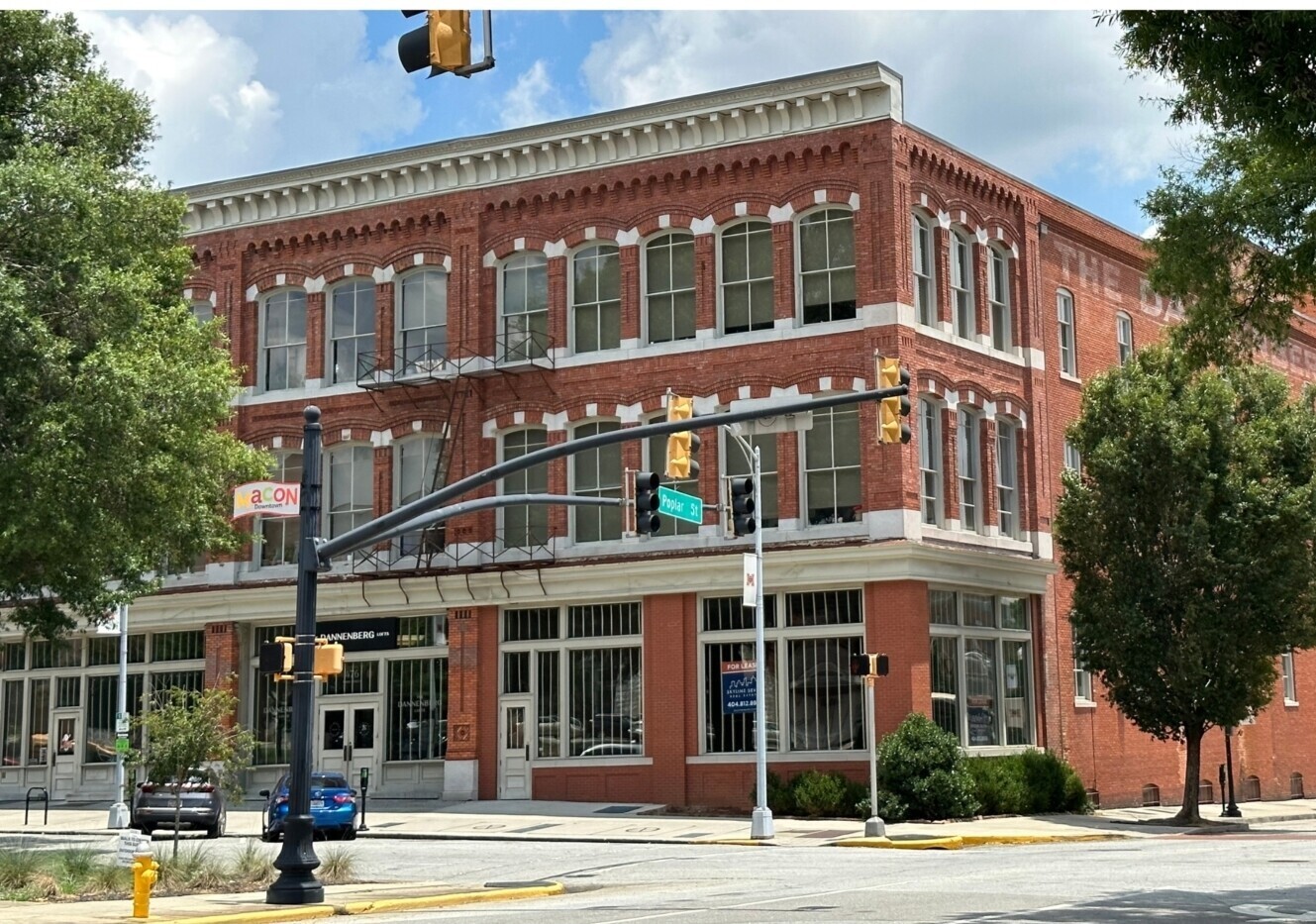 A historic brick building on a downtown street corner