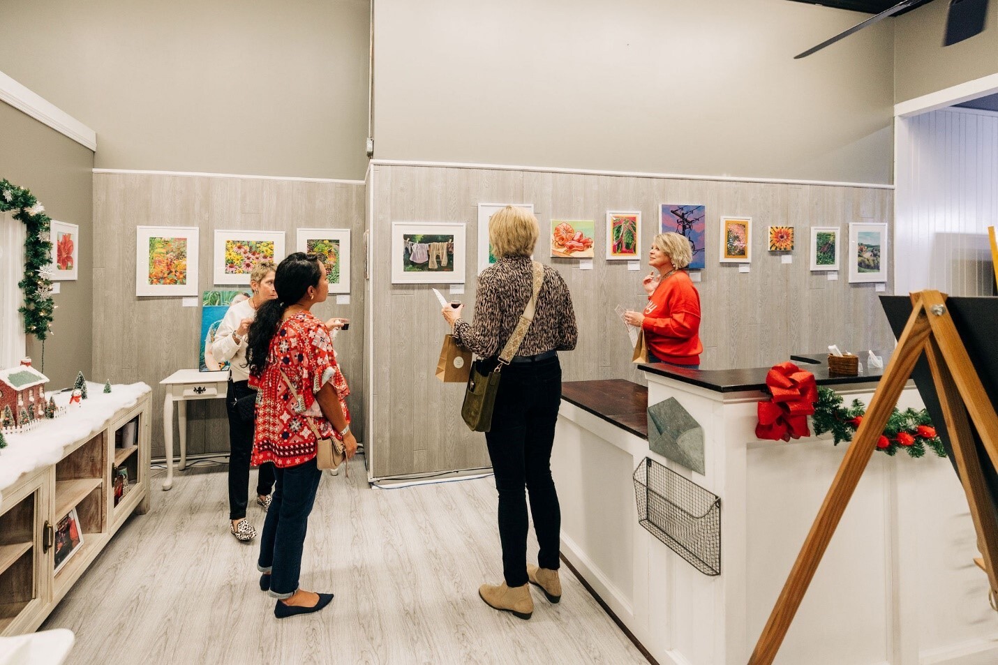 People looking at art in a gallery space
