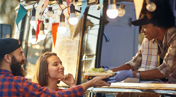 People buying food from a food truck