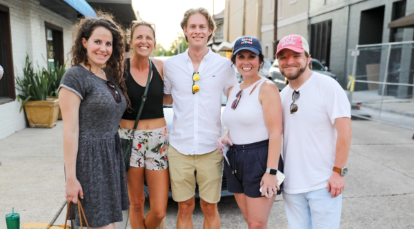 Five people pose in downtown Thubodaux