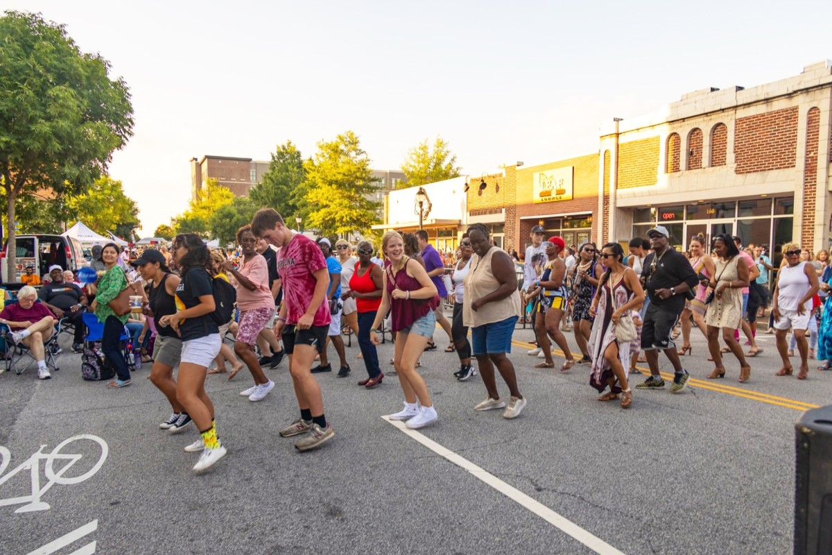 People dancing in the street in Florence, South Carolina.